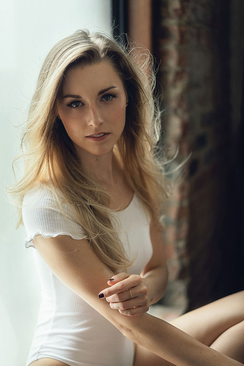55mm F1.8 Portrait with Ashley in white body suit close up shot