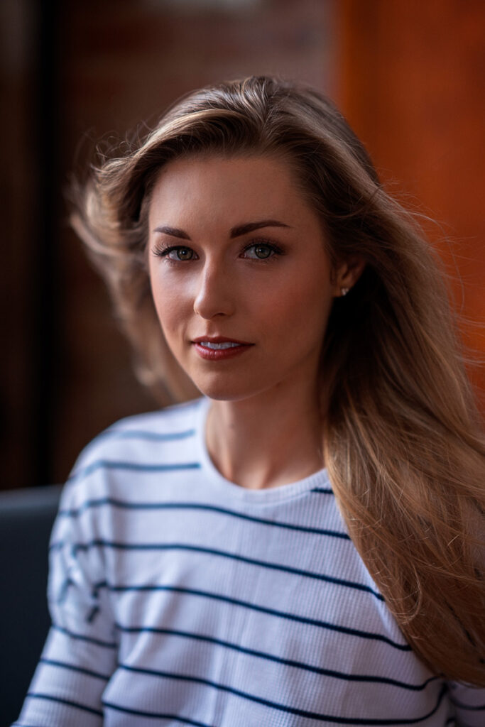 Ashley in white sweater 85mm portrait facing forward